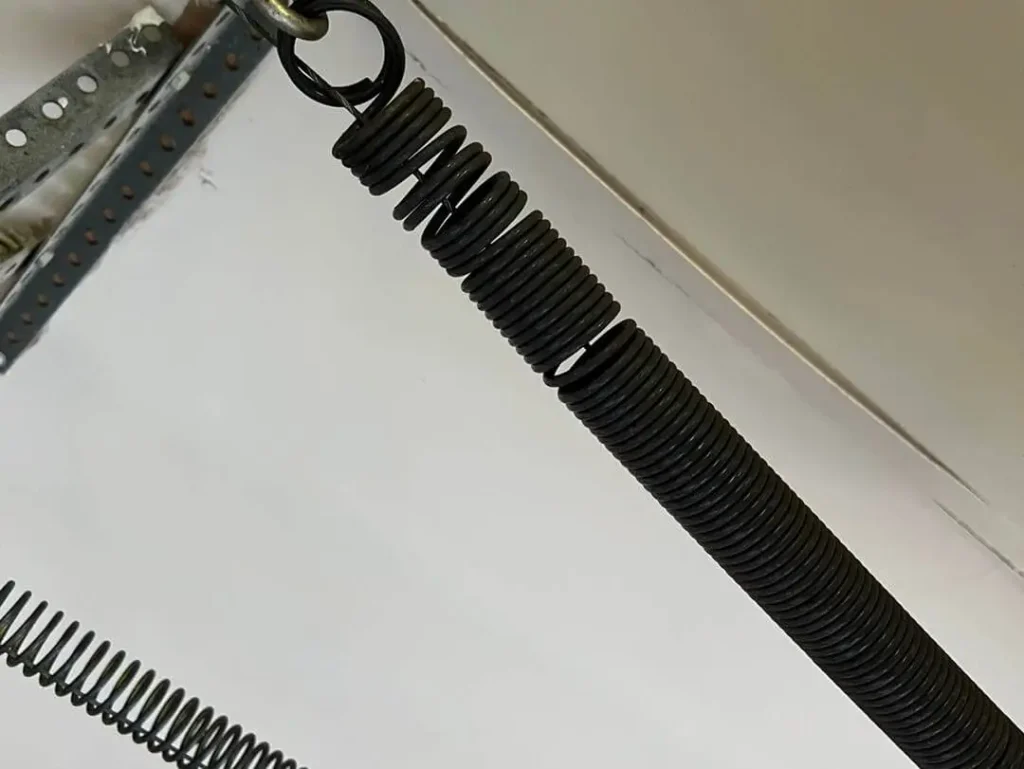 Broken Garage Door Spring that should be replaced
